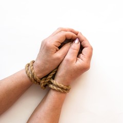 Bound hands isolated on white background