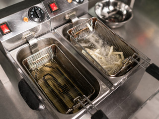 Fast food restaurant. Improper nutrition, high-calorie meals concept. Modern lifestyle - no time to eat properly