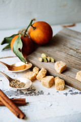 Celebrate new year winter evening with hot drink. Mulled wine or grog ingredients. White background top view. Space for text