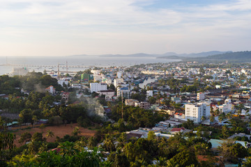Fototapeta na wymiar DUONG DONG, PHU QUOC, VIETNAM - NOVEMBER 21, 2017: Beautiful view from the high on town, sea, bay and hills at afternoon day time