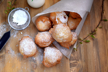 French doughnuts Beignet covered with sugar powder on a wooden table - 189973307