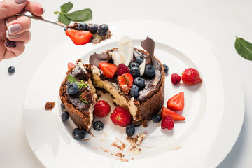 tasting sweet chocolate cake dessert recipe concept. restaurant food. delicious pastries. confectionery products.