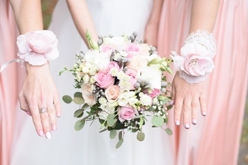 brides bouquet and bridesmaids flowers  