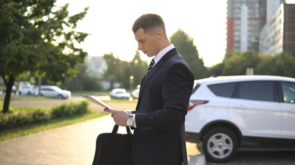 Business people while working near office building