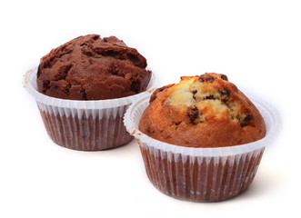 Fresh homemade muffins on white background. Top view.