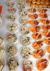 restaurant with cups filled with rice and ham with melon during the wedding reception
