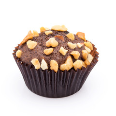 One chocolate muffins with nuts crumbs isolated on white background
