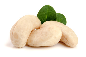 cashew nuts with leaf isolated on white background. macro