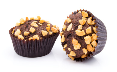 Group of chocolate muffins with nuts crumbs isolated on white background