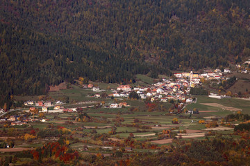 mountain panorama in autumn with small village called MEZZA SELVA in Northern Italy