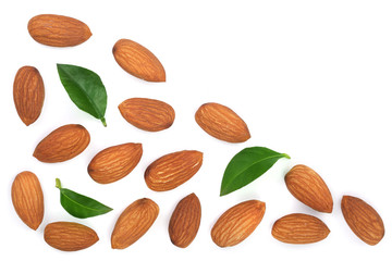 almonds with leaves isolated on white background with copy space for your text. Top view. Flat lay pattern