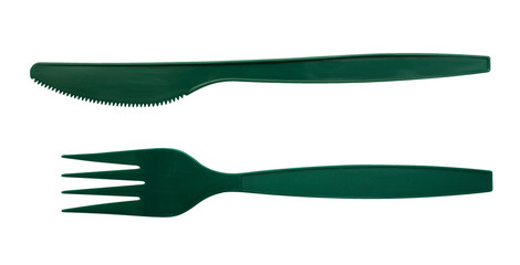 Green plastic cutlery fork and knife isolated on white background, clipping path included