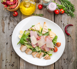 Healthy Grilled Chicken Caesar Salad with Cheese and Croutons