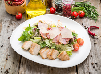 Healthy Grilled Chicken Caesar Salad with Cheese and Croutons