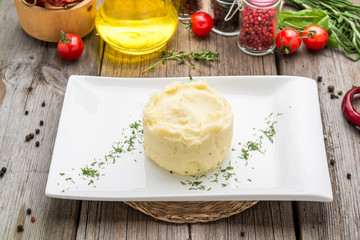 Potato Mash on rustic wooden background