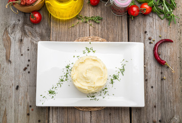 Potato Mash on rustic wooden background