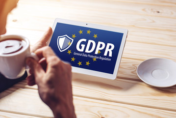 General Data Protection Regulation GDPR . The text with the EU flag depicted on tablet