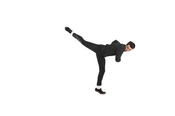 Kick roundhouse kick jumping isolated on white background