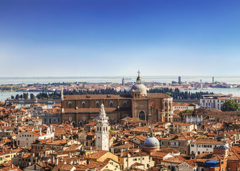 Panorama view of the roofs of Venice from the top of the St Mark's bell tower ( San Marco Campanile ) of St. Mark's Basilica in Venice, located on St. Mark's Square in Venice, Italy
