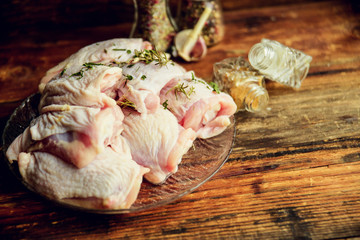 chicken legs raw chicken on wooden background natural