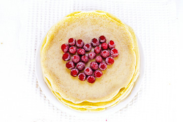 heart of raspberry on pancakes