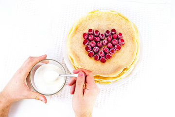 pour sour cream on pancakes