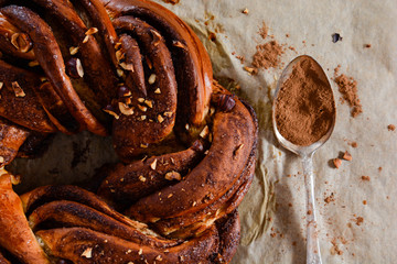 Fresh buns with cinnamon. Cinnamon wreaths.
