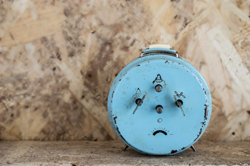 Blue Vintege clock making sade face