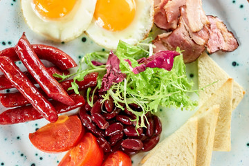 Mix of different food closeup. Slided food and beans with lettuce.