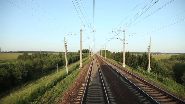  Moving train pov footage. Railway. Trees clear sky