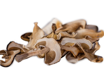 dried porcini mushrooms Dried porcini mushrooms on a white background. Food background. Rustic style.