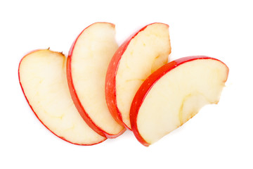 Apple slices isolated on white background close-up. Top view