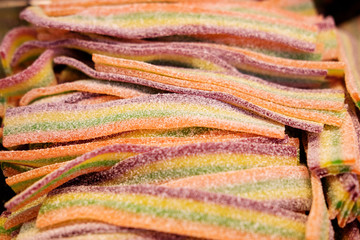 colorful gummy worms sprinkled with sugar
