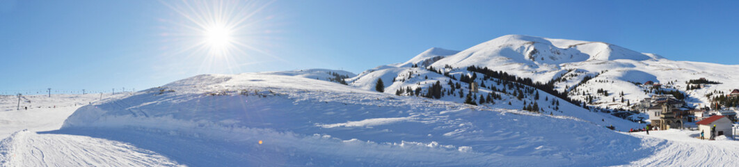 Fototapeta na wymiar Sunny winter landscape panorama of Popova Shapka
