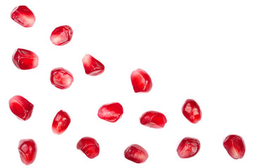 pomegranate seeds isolated on white background with copy space for your text. Top view. Flat lay pattern