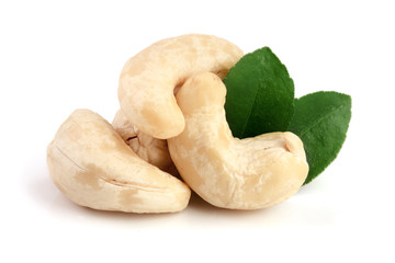 cashew nuts with leaf isolated on white background. macro