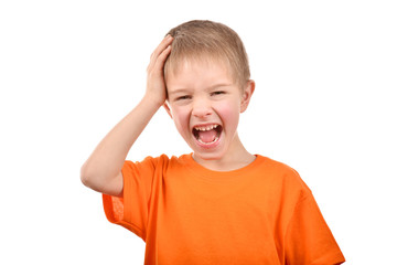 Emotional portrait of a teenager. A boy in an orange t-shirt. Beautiful and happy child isolated on a white background.