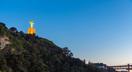 Fototapeta na wymiar Jesus Christ monument sunset Lisbon