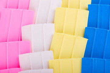 Fototapeta premium Tailor chalk. Colorful chalk for sewing. Background of colored chalk. Chalk of different colors for tailor's work.