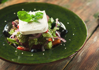 Fresh spring vegetable salad with feta cheese