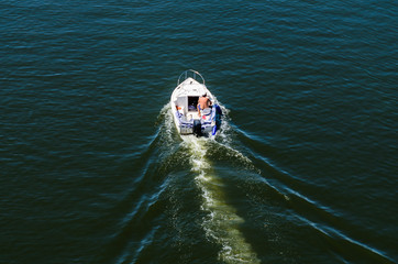 Obraz premium Motor boat on a river Dnieper