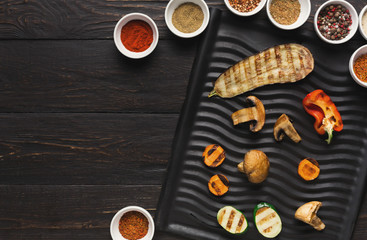 Obraz na płótnie Canvas Grilled vegetables with spices top view