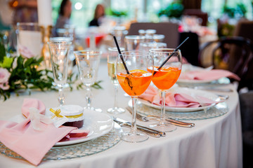 cocktails on a table with straws