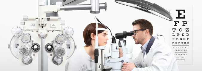 optometrist doing eyesight with woman patient measurement with slit lamp on white background - obrazy, fototapety, plakaty
