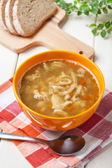 Traditional polish tripe soup with vegetables.