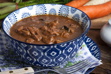 Goulash soup with pork and mushrooms.