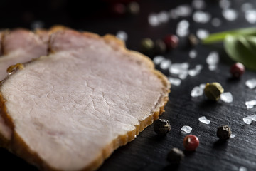 Detail of traditional slices of smoked pork