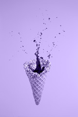 Levitating sugar cone with splashes. Coffee concept. Minimal art trend. Solid background