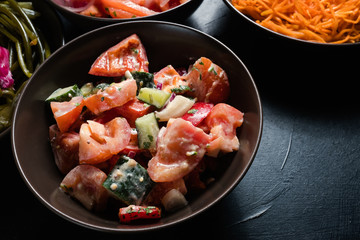 fresh tomato salad. Healthy vitamin dinner. Fitness diet food concept. Organic vegetables