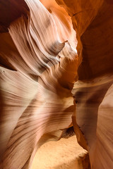 Small Path through Upper Antelope Canyon. Natural rock formation in beautiful colors. Beautiful wide angle view of amazing sandstone formations. Near Page at Lake Powell, Arizona, USA